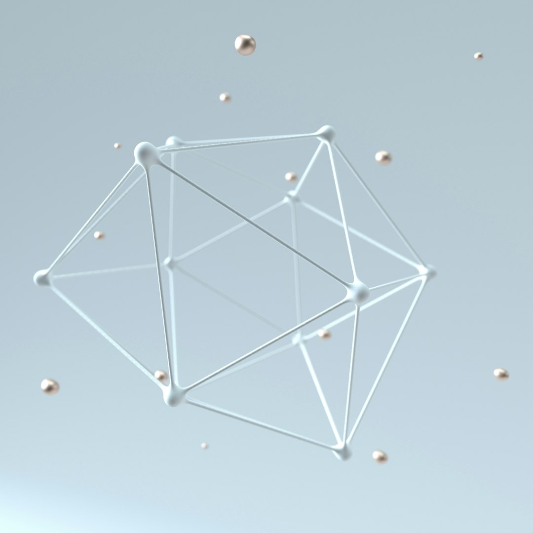 3D wireframe polyhedron with metallic spheres